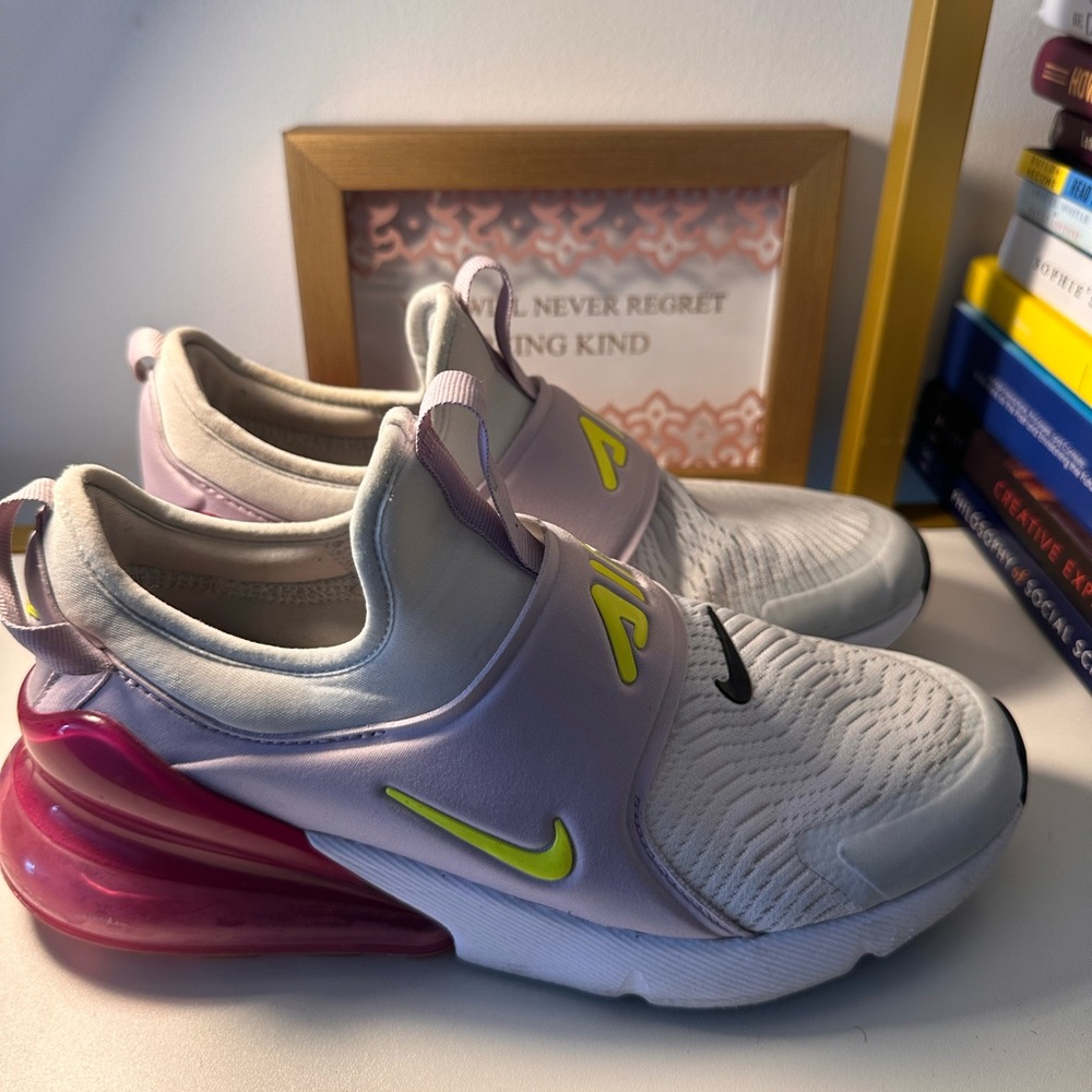 Nike slip on sneakers; gently worn and ready for your closet!